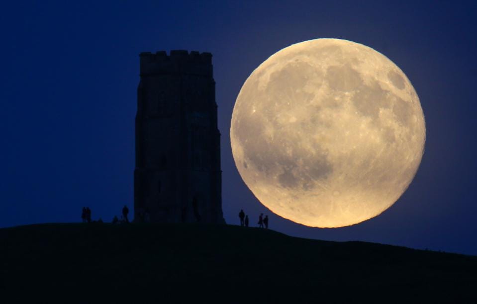 Blue Moon Rises Over Glastonbury Tor